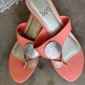 Adorable coral and silver sandals.